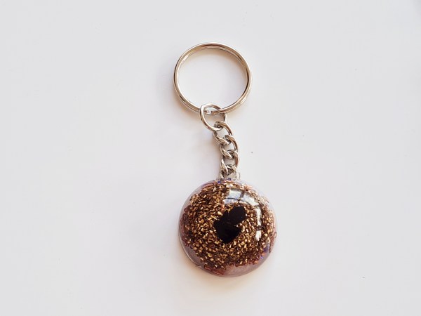 porte clé orgonite rond marron graine de vie